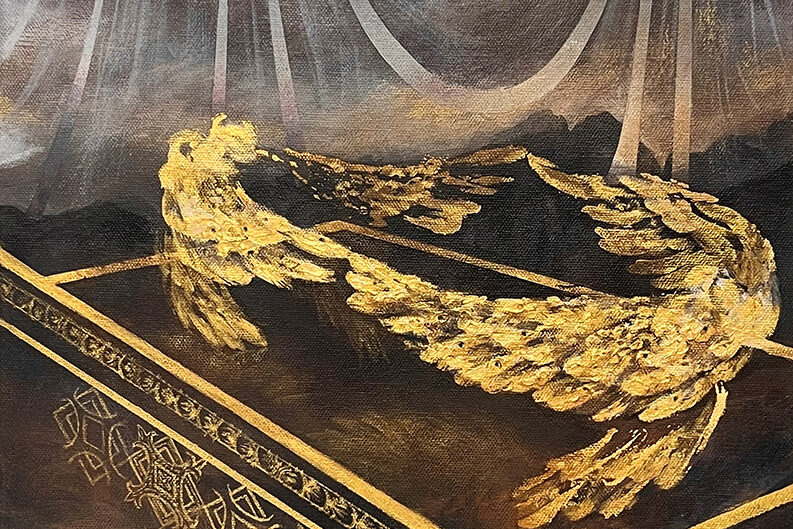 Golden wings on a dark background
