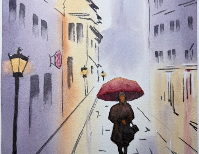 Person with umbrella walking in rain