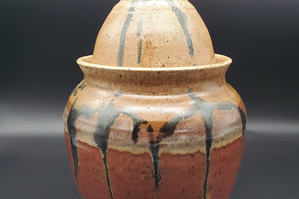 brown pottery container with lid