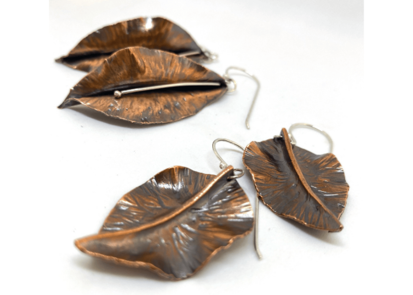 Copper leaf earrings with silver hooks
