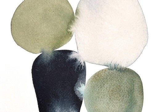 Abstract watercolor circles in muted colors.