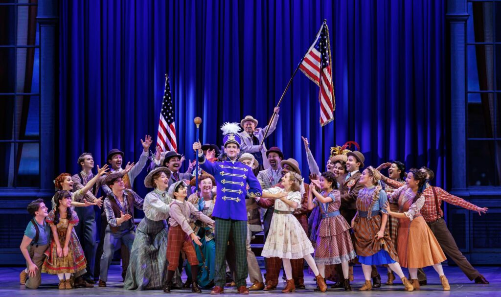 Theatrical performance with enthusiastic cast.