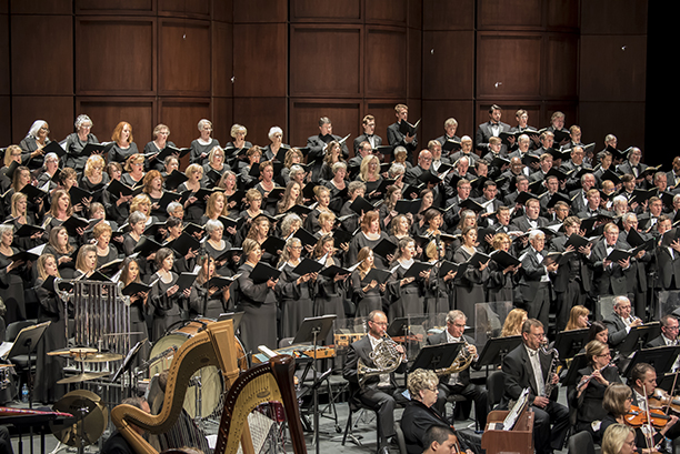 a group of people in choir uniforms