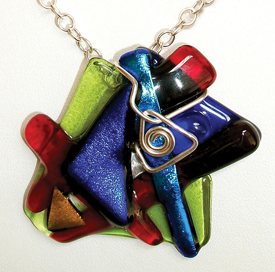 Dichroic glass & sterling silver
1.75 x 2 inches
