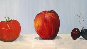 a group of apples on a table