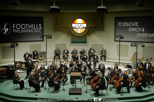 a group of people in a concert hall