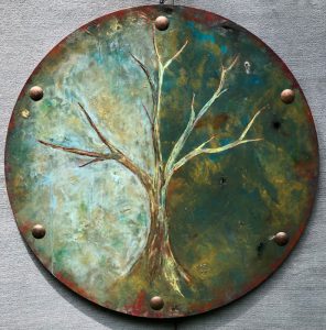 a circular painting of a tree