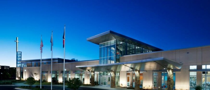 a building with a flag pole