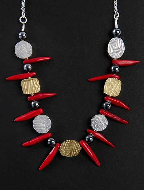 Gold, sterling silver, hematite and dyed coral 
12 inches