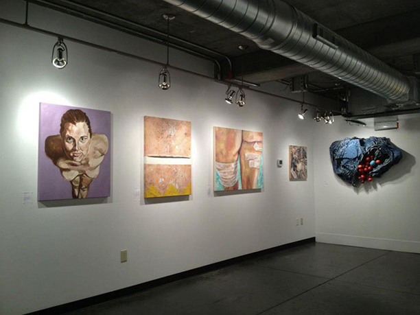 a room with paintings on the wall