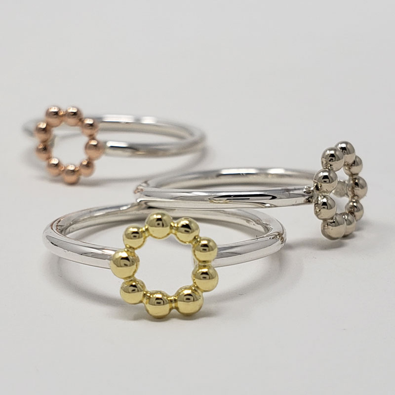 18k yellow, rose and white gold: sterling silver
0.75 x 0.75 x 0.25 inches