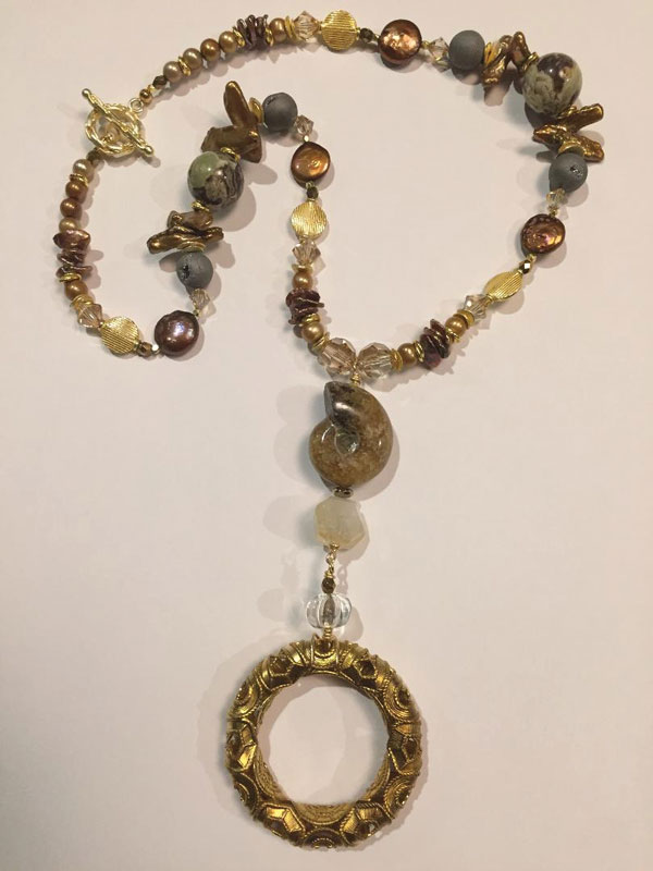 Freshwater pearls, gold
metals and gemstones
29 inches