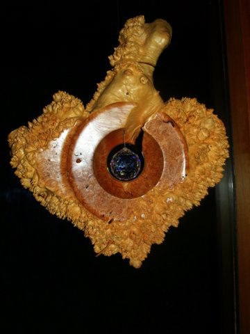 Maple Burl with brass
inlay and Swarovski crystal
24 x 18 x 3 inches