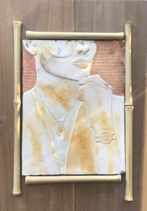 a picture of a person on a bamboo frame