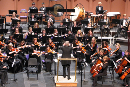 a orchestra performing on stage